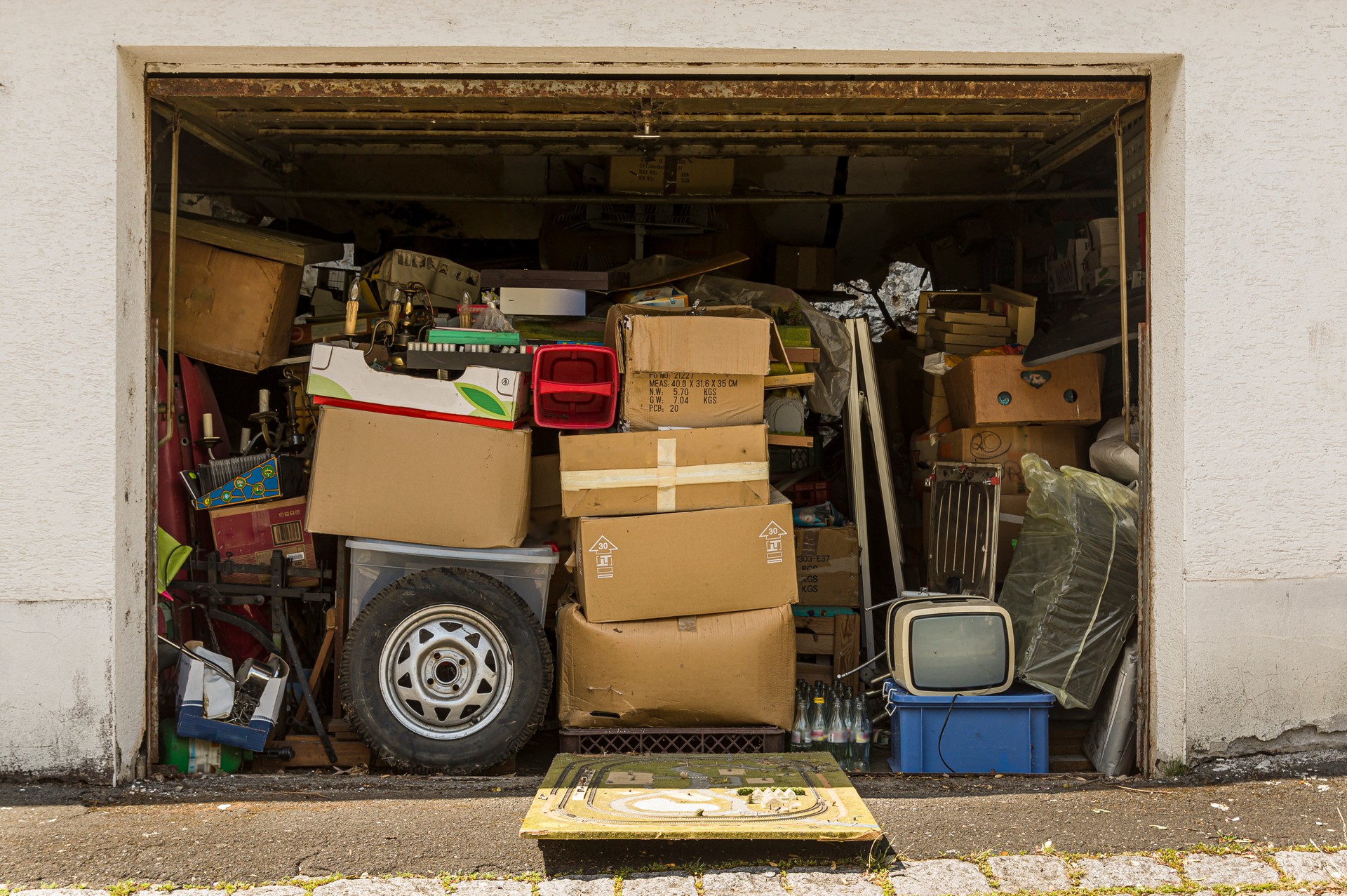 Garage full and stuffed with old stuff and open in good weather for airing